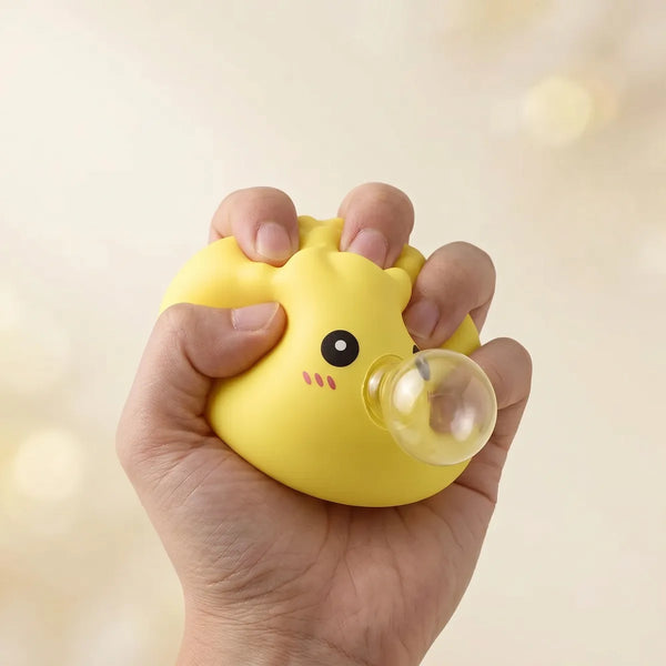 Yellow blow dumpling squishy styled on a desk